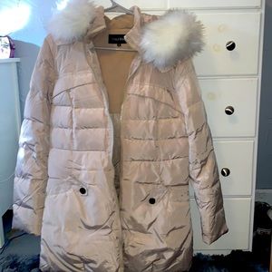 beige colored winter jacket, the fur on the hood is detachable, size xs